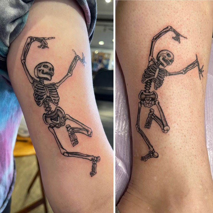 Skeleton BFF tattoo ideas with two playful dancing skeleton designs on arms.