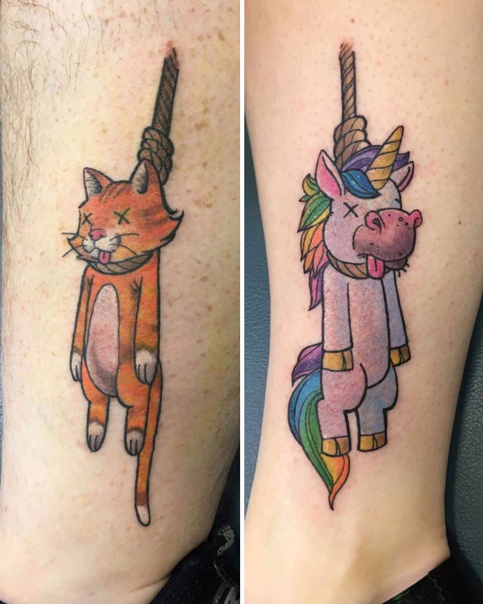 Friendship tattoos featuring a cartoon cat and unicorn with funny expressions on two different arms.