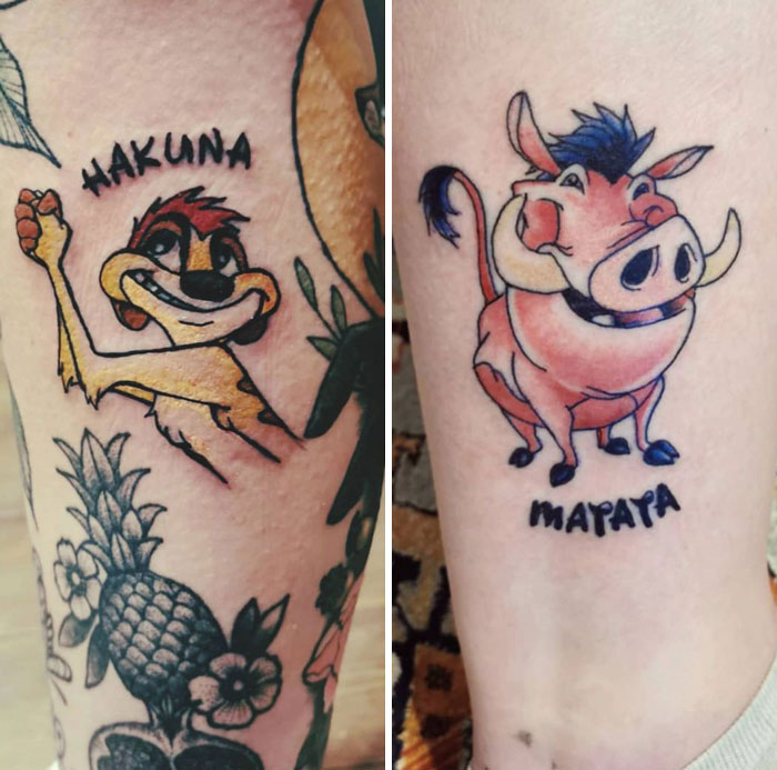 Tattoos of cartoon animals with the words "Hakuna" and "Matata," symbolizing best friend tattoos for lasting friendship.