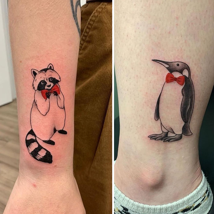 Raccoon and penguin tattoos with red bow ties symbolizing friendship.