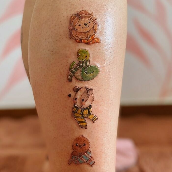 Cute Harry Potter tattoo featuring cartoon versions of familiar magical creatures on a leg.