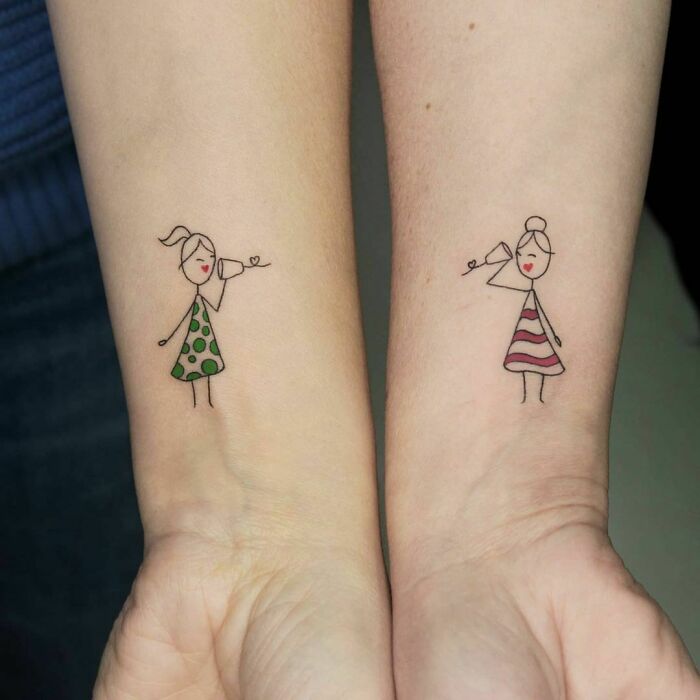 Matching minimalist best friend tattoos on wrists featuring stick figure girls with tin can phones.