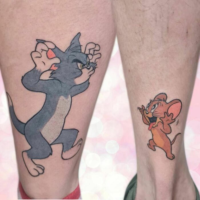 Tom and Jerry brother and sister tattoos on legs, showcasing small and simple matching designs.