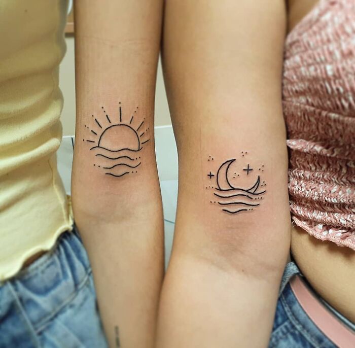Matching sun and moon best friend tattoos on inner arms, symbolizing eternal friendship.