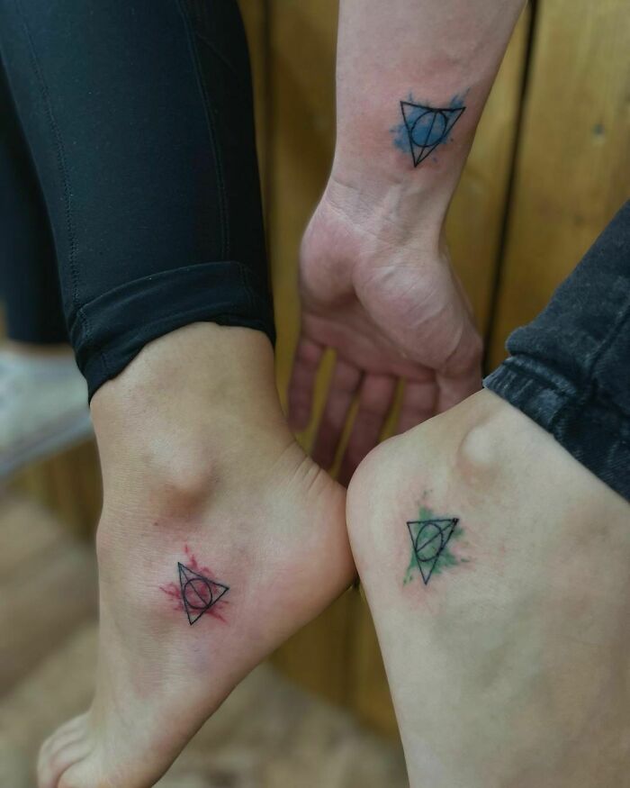 Brother and sister tattoos featuring matching geometric designs on ankles and wrist.