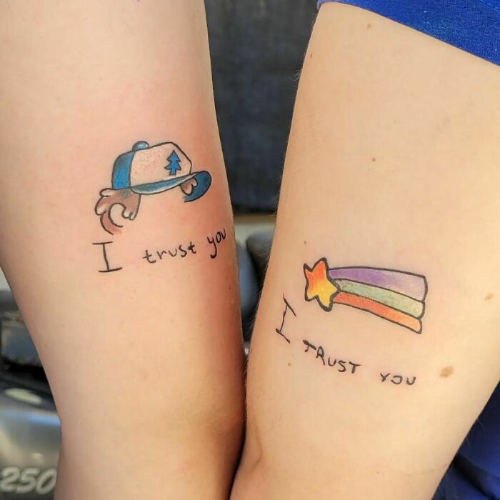 Brother and sister tattoos featuring a cap and shooting star with "I trust you" text.