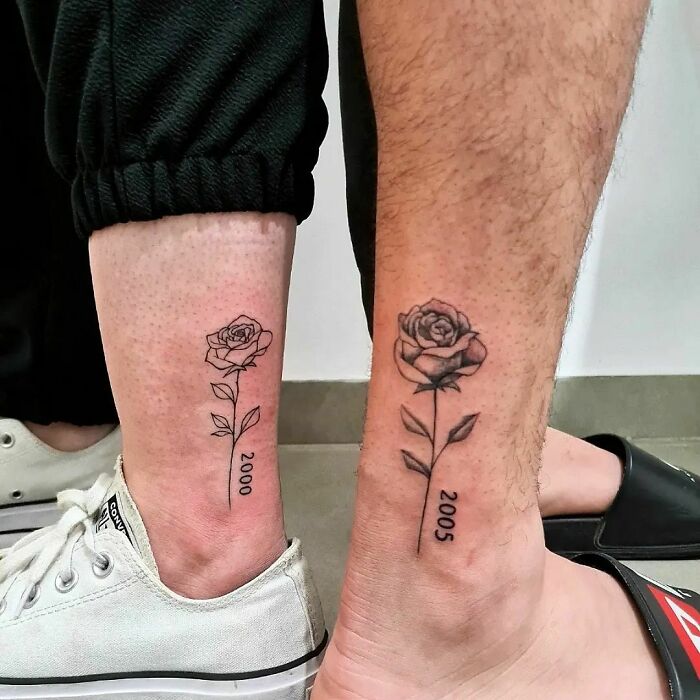 Matching brother and sister tattoos with roses and birth years on their ankles.