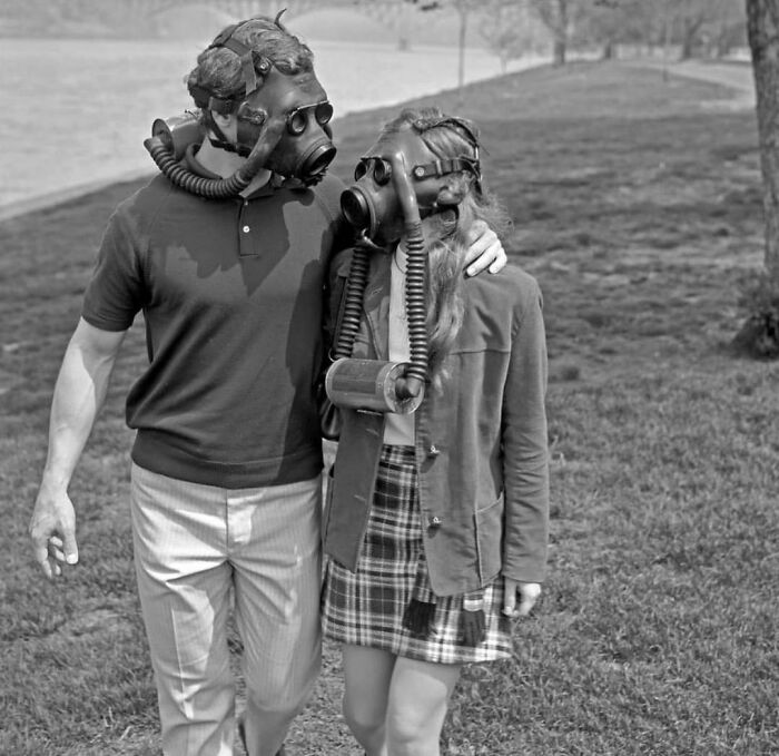 A Couple Making A Point About Smog And The Environment, 1970. Photo By H. Armstrong