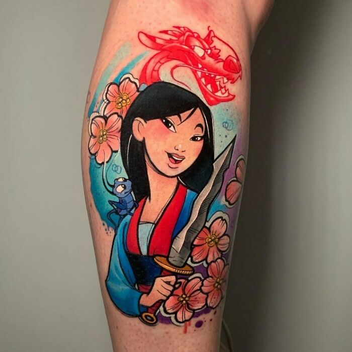 Cartoon tattoo of a warrior princess Mulan with flowers and a dragon.