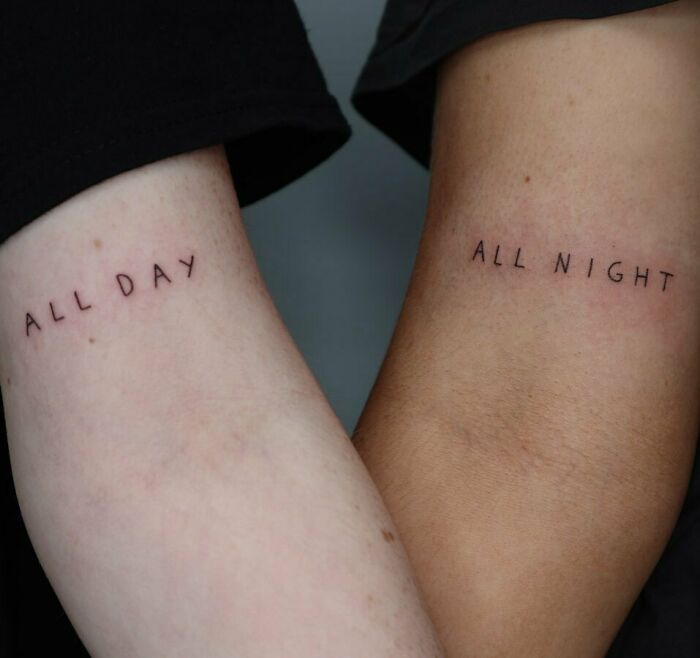 Word tattoos on arms reading "ALL DAY" and "ALL NIGHT" for tattoo inkspiration.