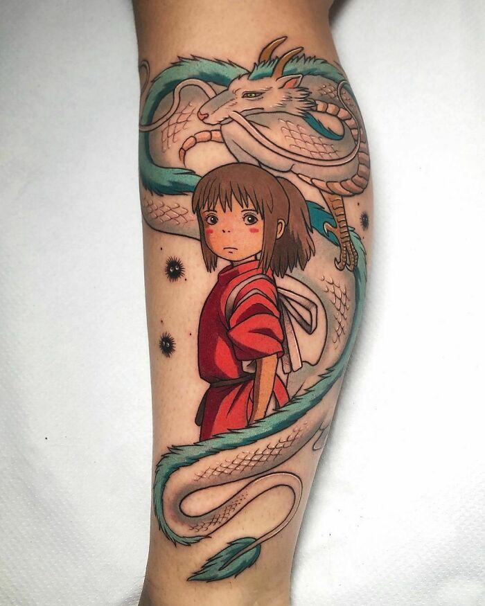 Chihiro from Spirited Away tattoo featuring dragon, evoking cartoon nostalgia.
