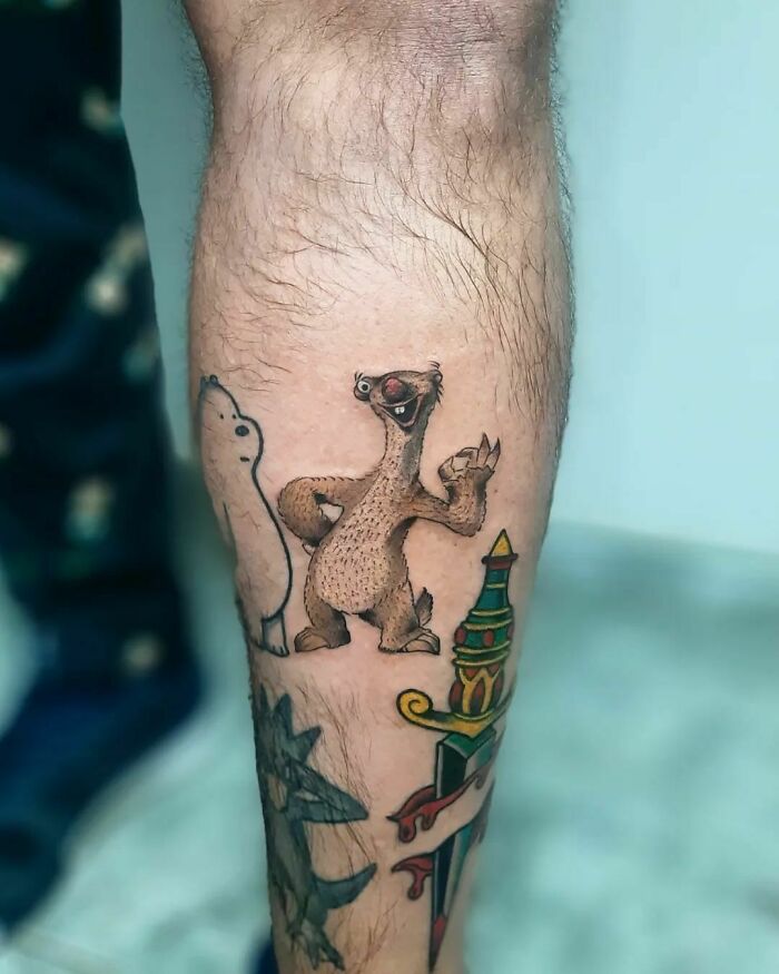 Sid from Ice Age tattoo on leg, featuring a playful cartoon design for nostalgic flair.
