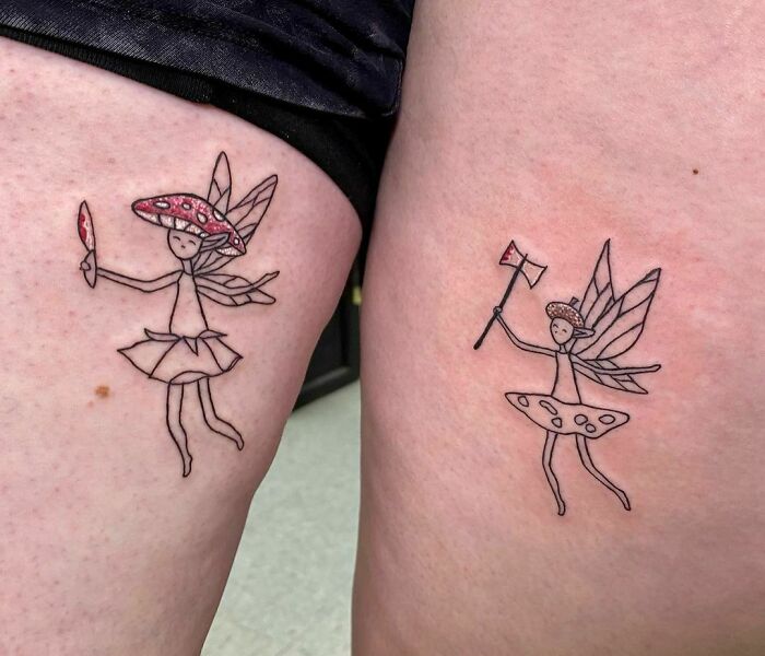 Two matching fairy tattoos on thighs, symbolizing best friend tattoos and celebrating friendship.