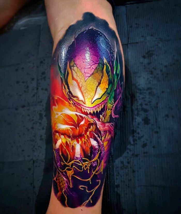 Colorful Marvel tattoo featuring a vivid, fierce character design with dramatic shading on a leg.