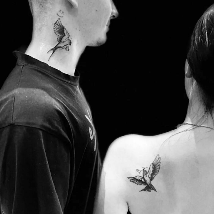 Brother and sister tattoos of birds, one on his neck and another on her shoulder, symbolizing connection and unity.