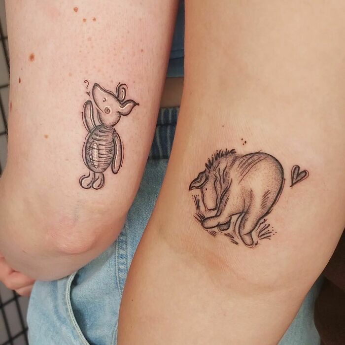 Piglet and Eeyore tattoos on arms symbolize friendship and best friend bonds.