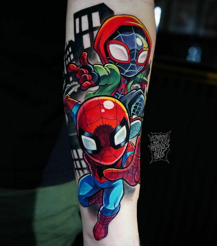 Marvel tattoo featuring colorful superhero-themed art on an arm.
