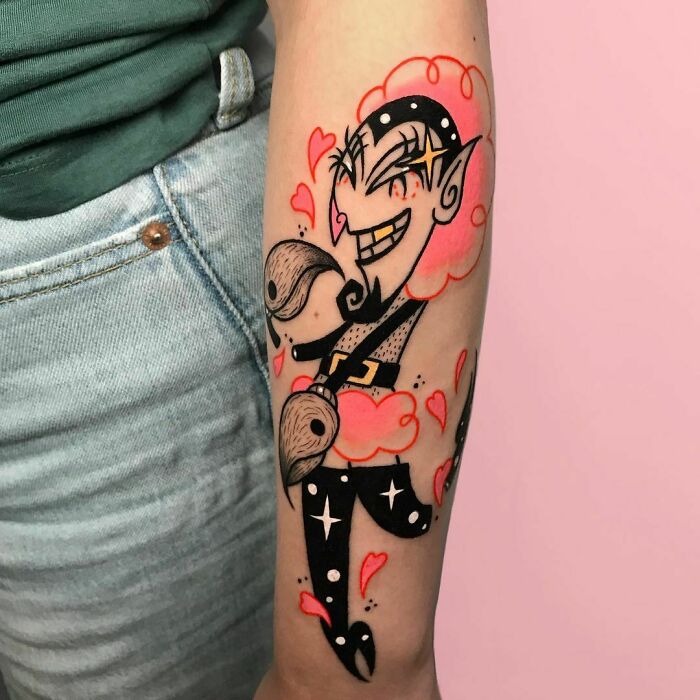 Cartoon tattoo featuring a whimsical character with pink and black details, inspired by favorite animated shows.