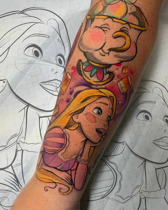 Colorful watercolor tattoo featuring animated characters on an arm, showcasing inkspiration.