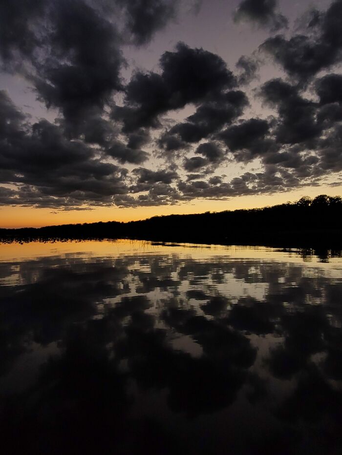 Reflections Of The Clouds On Lake Istokpoga In Florida Just After Sunset