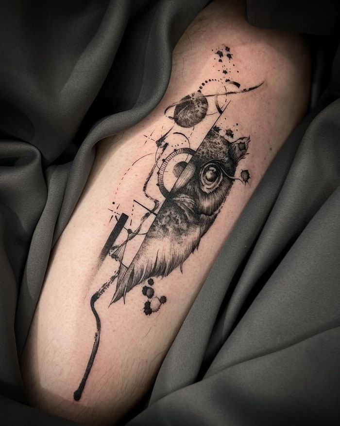 Abstract animal tattoo design showcasing simplicity and realism on skin, with intricate black ink details.