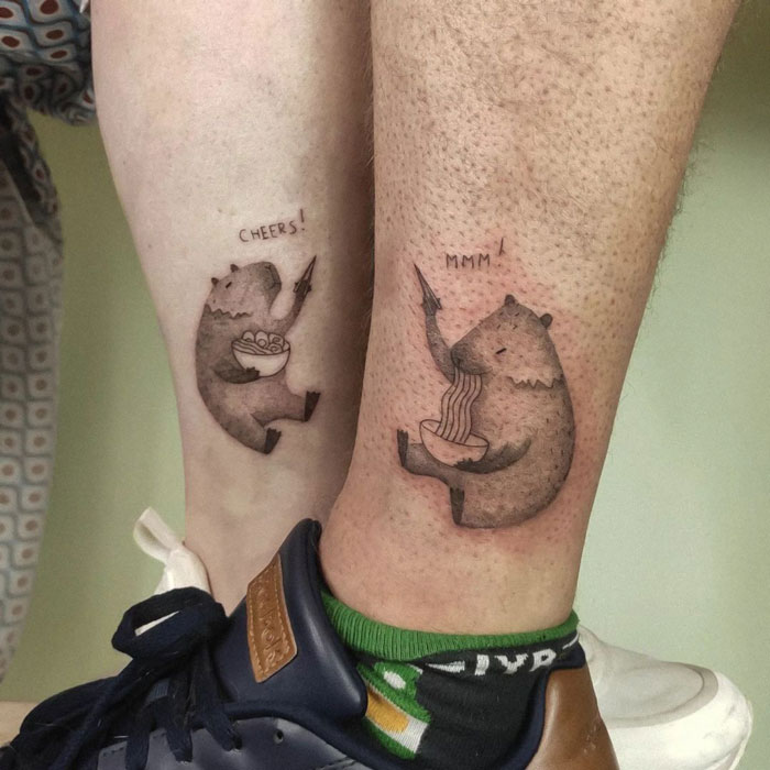 Bear tattoos on legs, each holding a bowl and chopsticks, celebrating the animal kingdom.