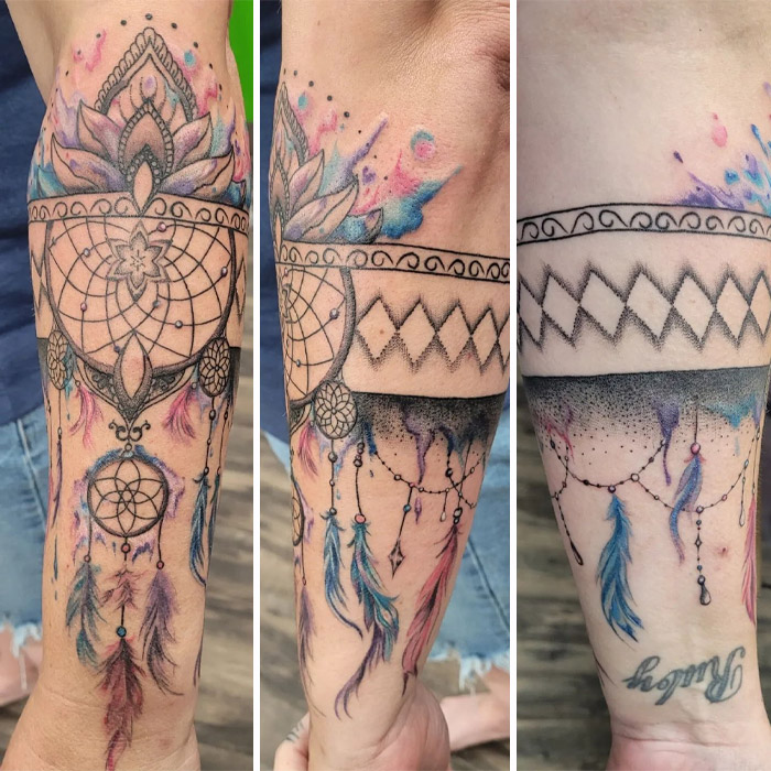 Colorful armband tattoo featuring dreamcatcher and feather designs.