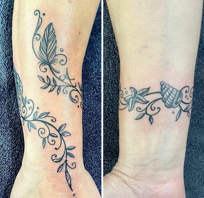Floral armband tattoos with intricate leaf and shell designs on wrists.