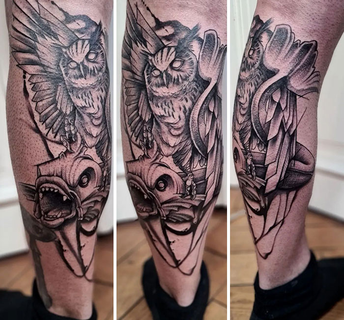 Lower leg tattoo featuring an intricate owl and shark design in black ink.