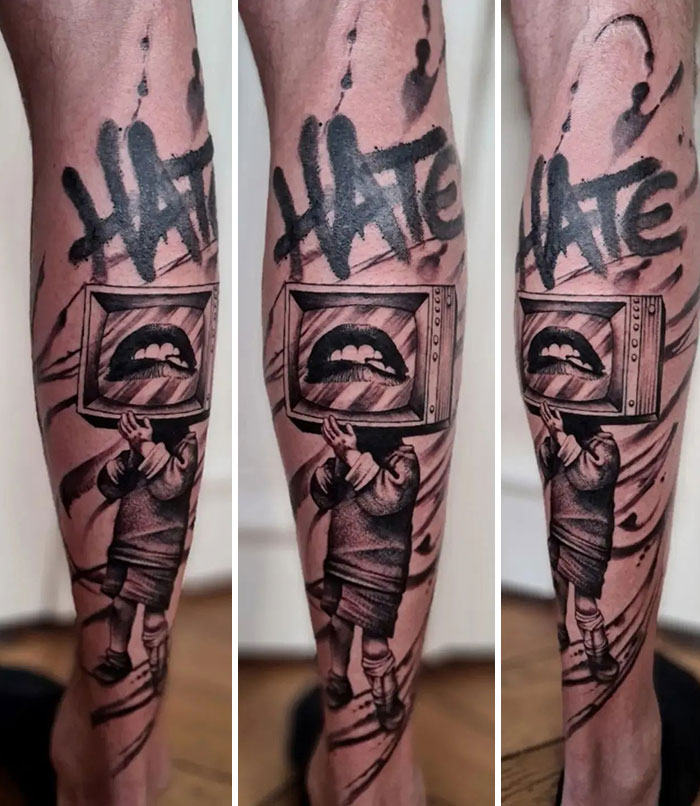 Unique calf tattoo featuring a TV head figure with graffiti text, combining surreal and street art styles.