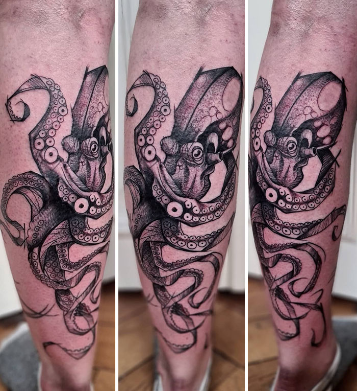 Octopus calf tattoo showcasing intricate black ink design.