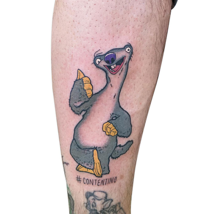Cartoon character tattoo on calf showcasing coolness and creativity.