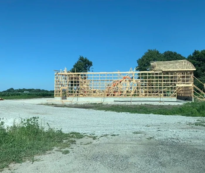 Several Roof Trusses Anchored Together. Came Down Like Dominos. Even What’s Still Up Is Warped All To Hell. Hire Professionals Kids…
