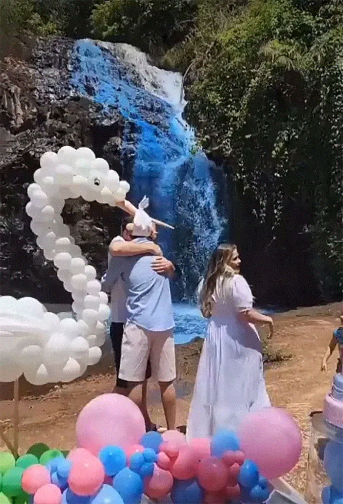 Couple Thought It Was A Good Idea To Dye A Whole Waterfall For Their Gender Reveal Party