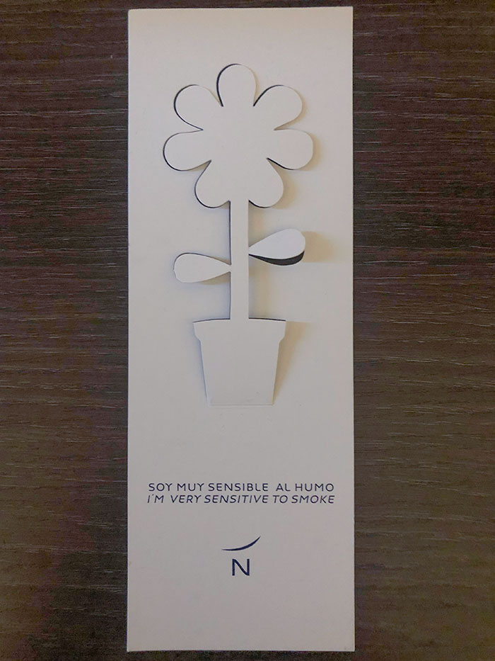 This Paper Cutout In My Hotel In Madrid That Changes Color If You Smoke In Your Room