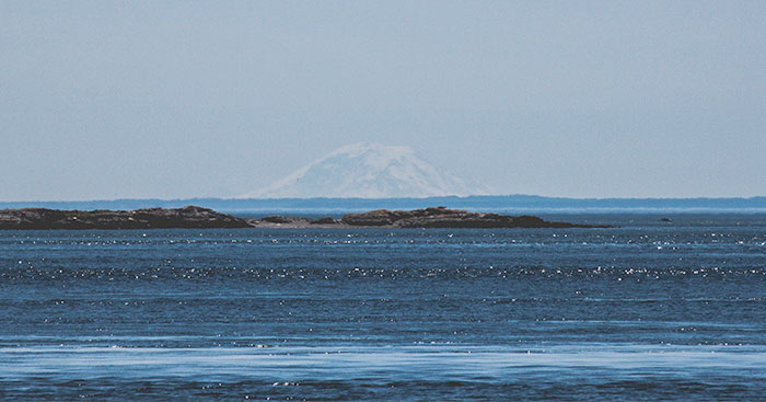 You Can See Mount Rainier From Canada, But Because Of The Earth's Curvature You Can Only See The Tip