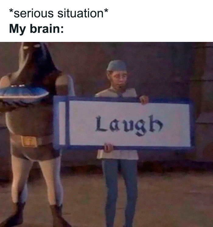 Medieval character holding a "laugh" sign in meme, illustrating iconic humor in internet culture.
