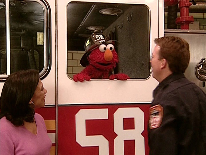 Sesame Street's Elmo Overcomes Fear Of Fire With The Help Of Firefighters