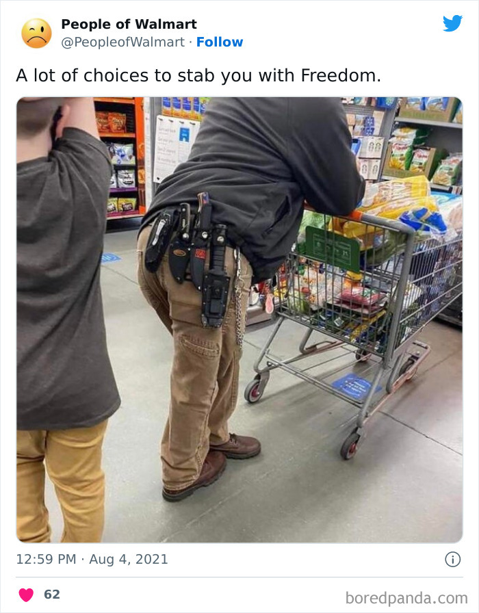 Shopper in Walmart with multiple tools attached to their belt, standing by a shopping cart.