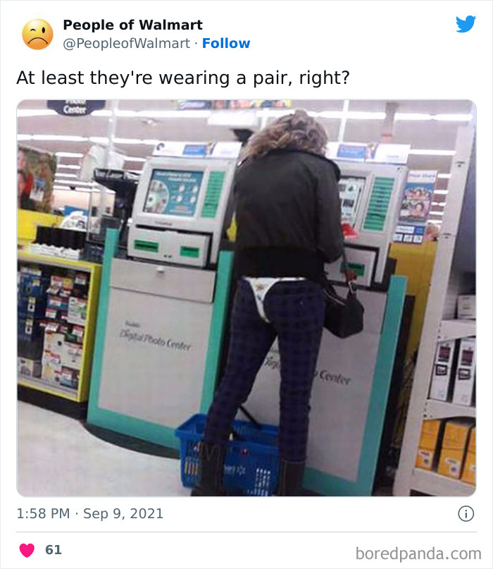Person in a store wearing unusual clothing that reveals underwear, standing at a kiosk, embodying shocking Walmart scene.