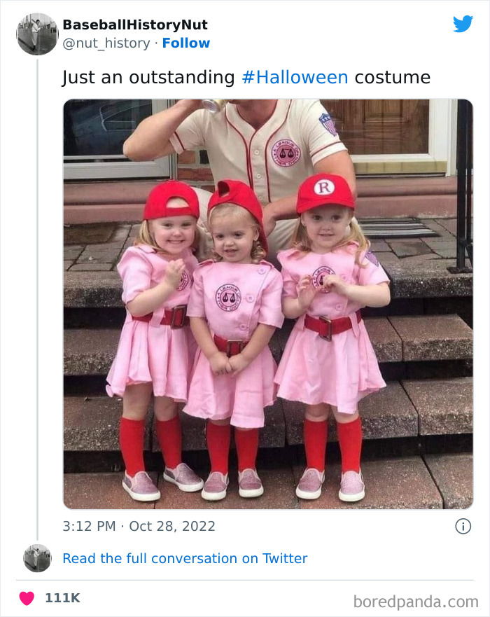 Three young girls in matching pink Halloween costumes with red hats and socks posing on steps, Halloween costumes inspiration.