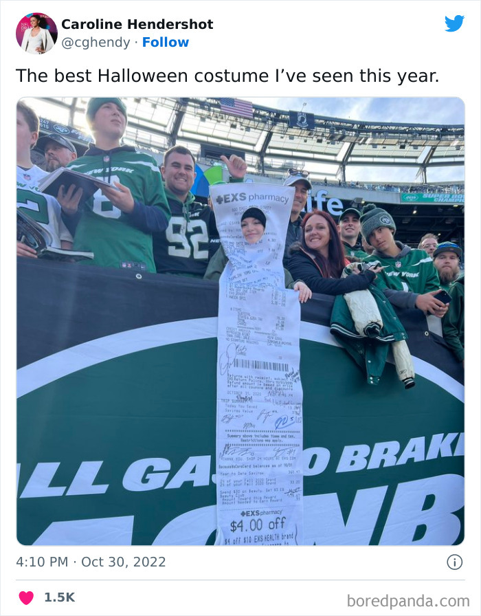 Child dressed as a long receipt at a sports event, surrounded by fans, showcasing creative Halloween costumes nailing the holiday.