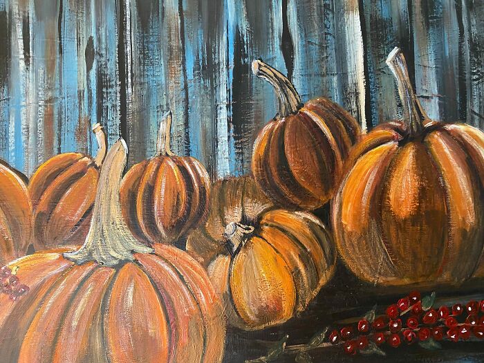 Pumpkins Against A Fence