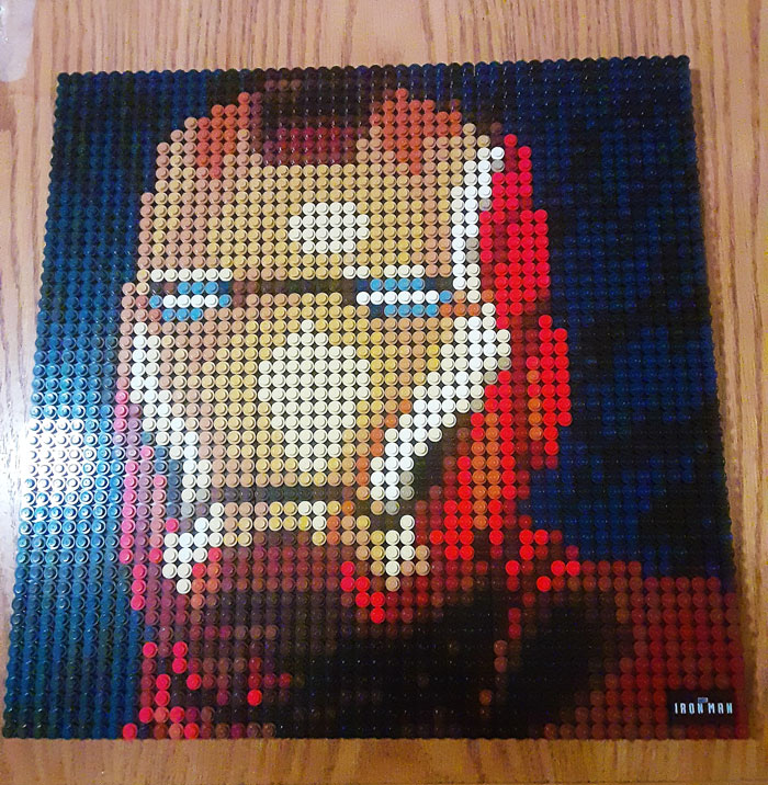 LEGO pixel art build of Iron Man's helmet featuring detailed colors in an incredible LEGO art display.