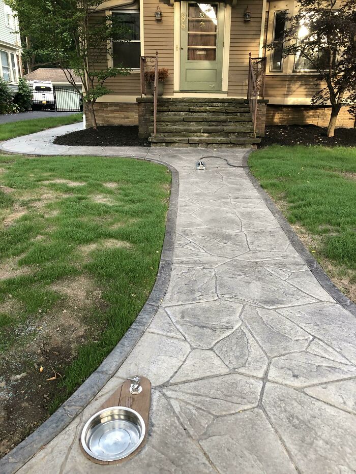This Drinking Fountain For Dogs, That This Person, Built Into Their Front Walkway