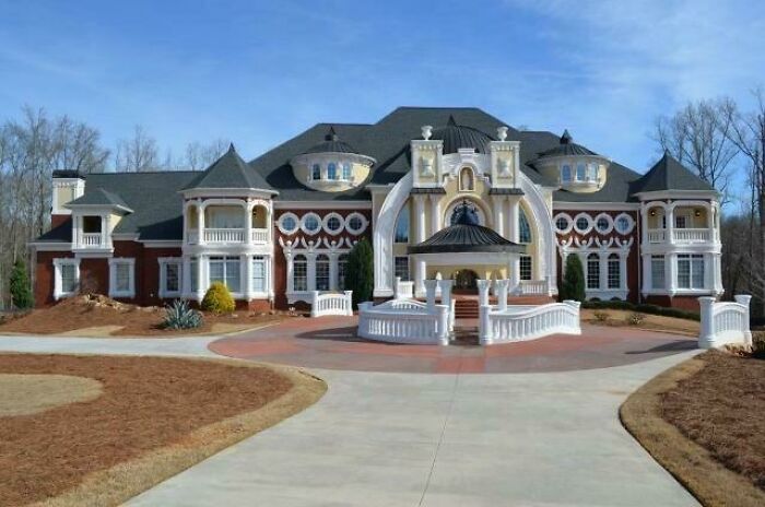 In Loganville, GA - Overseas Money Built An Entire Subdivision Of Tacky Mega Mansions. The Builder Didn’t Use An Architect And Built These All Based On His Own Vision... And Went Bankrupt