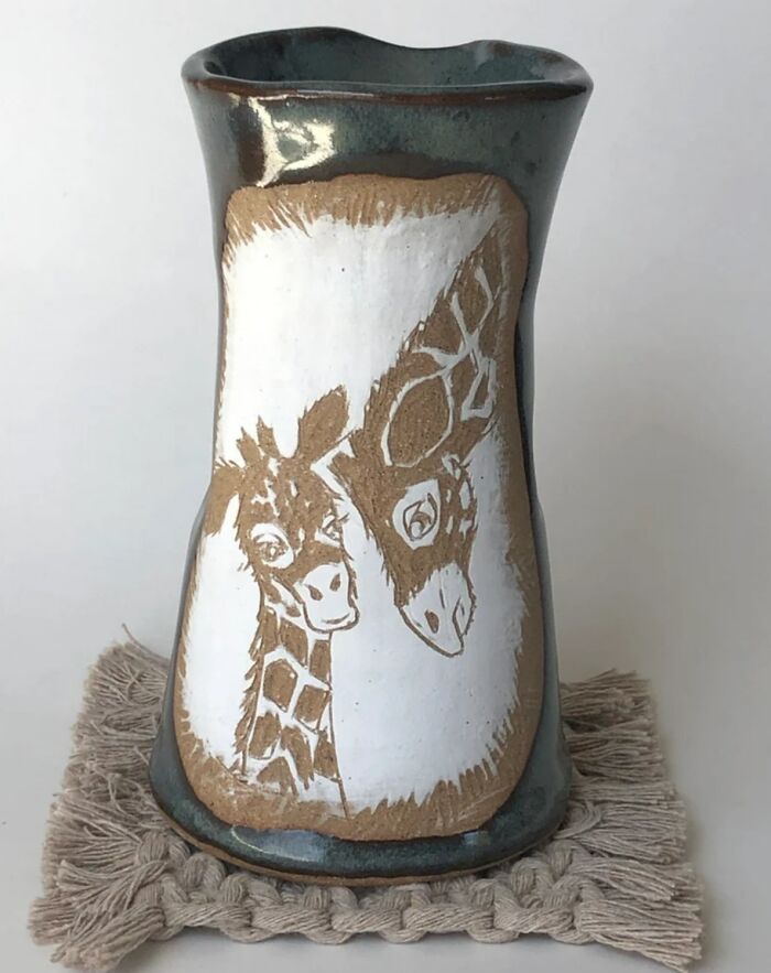 A Gentle Giraffe Nudges Its Baby... Welcome To The World Little One