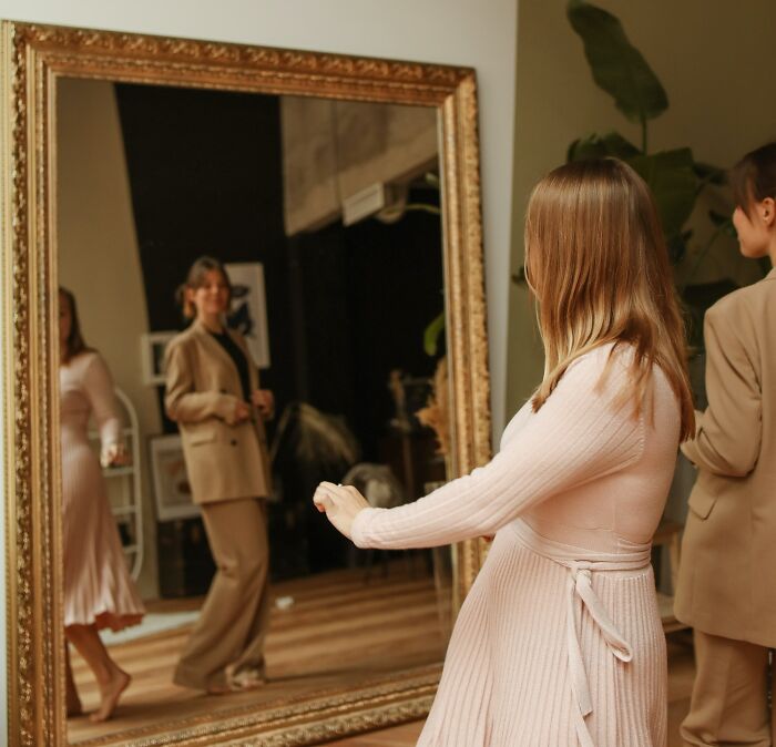 Woman Dancing In Front Of The Mirror 