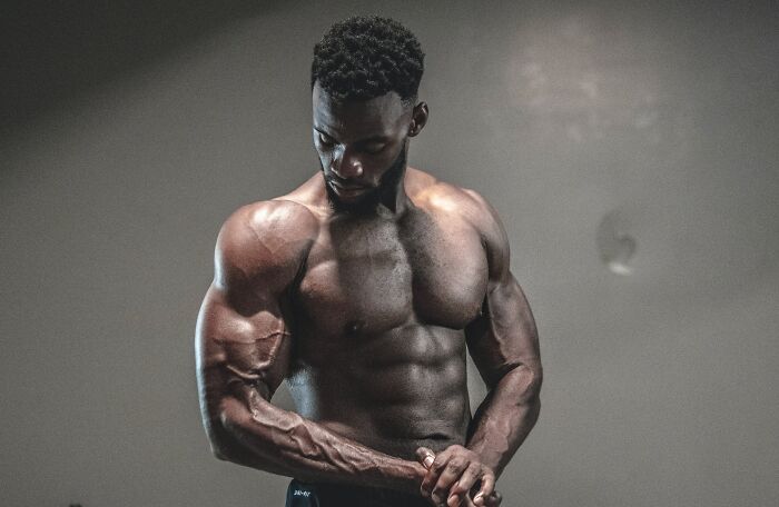 Bodybuilder Man Posing For A Photo 