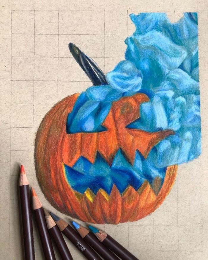 Colorful drawing of a pumpkin with blue smoke, using colored pencils for creative drawing prompts.
